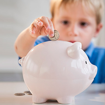 boy-with-piggy-bank-teaching-kids-about-money-pg-full